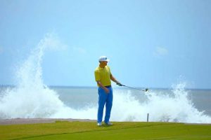 Estrella del Mar Golfer with ocean waves crashing