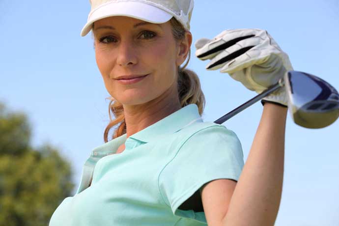 Female golf player exercising